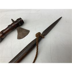 Tribal Art - an African axe, possibly Yoruba, the bone shaft carved as two cord bound stylised figures with iron fan-shaped blade, L35cm overall; and 19th century harpoon or spear head of square section with two long fixing arms on cut-down ash shaft L57cm (2)