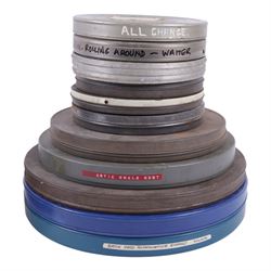 Collection of 9.5mm and 16mm cine film reels, mostly silent black and white with some notched examples, including 'Antarctic Whale Hunt' with sound, 'White Flame', 'The Good Old Days' electricity promotional, 'Rolling Around' Charlie Chaplin, etc, most in tin cases with hand written titles, together with two boxed sets of lantern slides, 'The Transvaal War', 'The Sweep & The Whitewasher' and 'Willies Revenge'