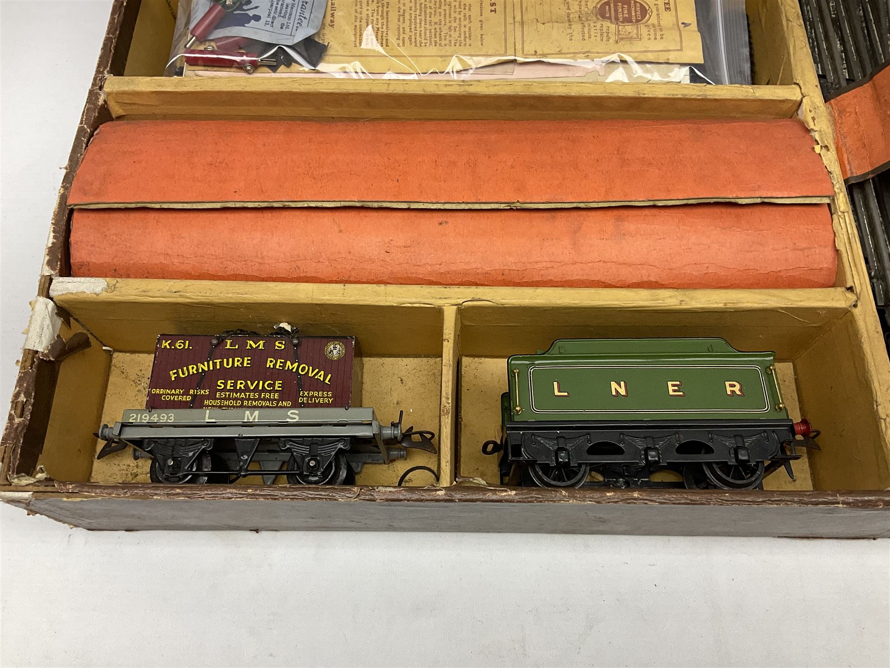 Hornby '0' gauge - three-rail electric train set with LNER Riviera Blue 4-4-2 locomotive 'Flying Scotsman' No.4472 and No.3 tender, No.2 Special Pullman Coach 'Loraine', No.2 Special Pullman Composite Coach 'Verona', goods wagon with Furniture Removals container, boxed Circuit Breaker, two boxes of Connecting Plates, boxed Terminal Connecting Plate and quantity of track; boxed with paperwork; together with Breakdown Van and Crane and Transformer No.T20A; both boxed