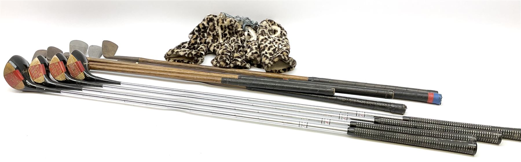 Golf - three early 20th century hickory shafted irons marked R. Simpson, Harrods Ltd etc; child's wooden shafted putter; two transitional wood grain steel shafted irons, one marked Tom Morris; and set of four Macgregor Tommy Armour woods (10)