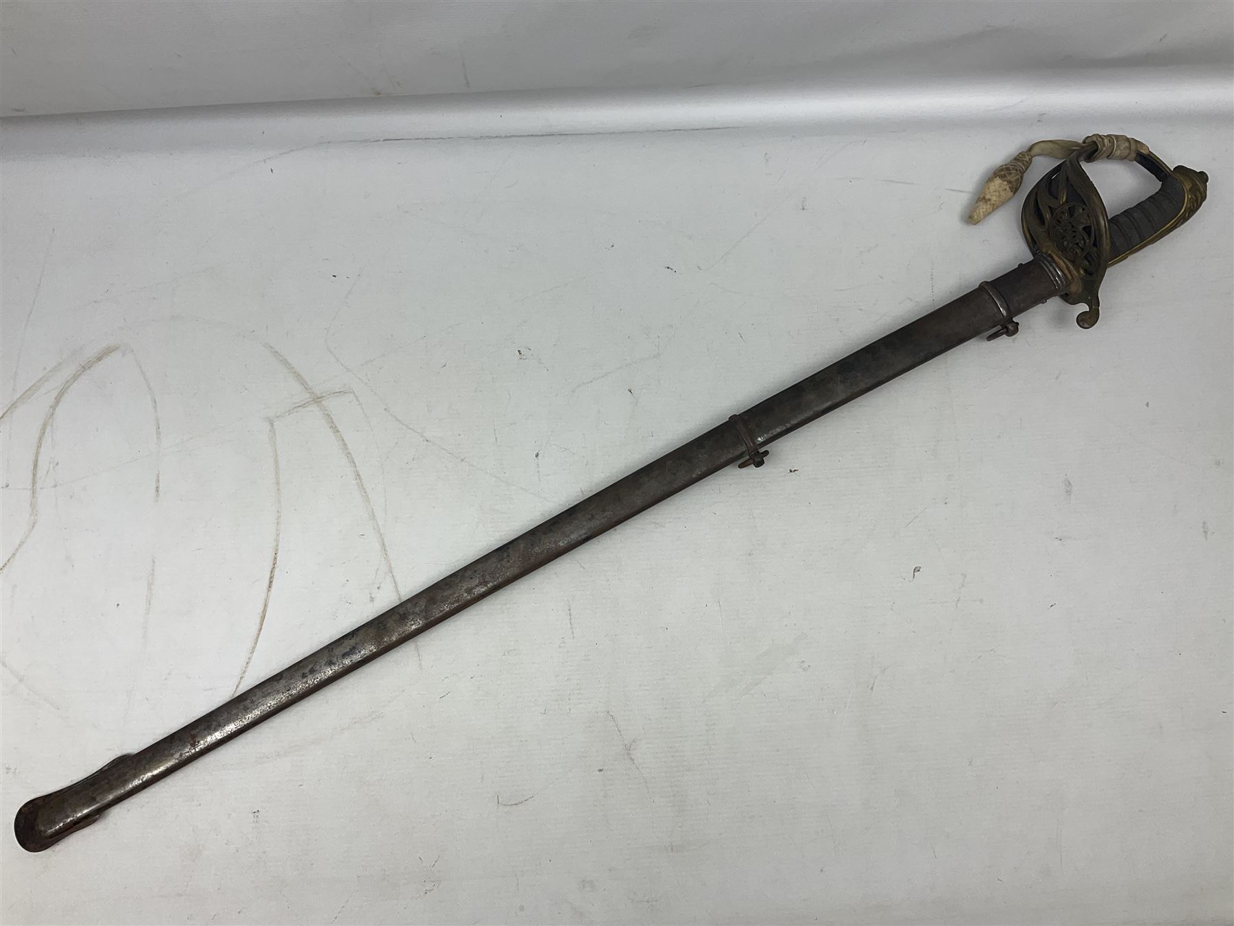 Victorian British Army officer's sword by Hobson & Sons Little Windmill Street London, the 82cm fullered steel blade etched with crowned Victoria cypher and 'HM 1st West York R.V.', lined gilded brass three-bar hilt incorporating Victoria cypher and wire-bound fish skin grip with plaited knot; in steel scabbard with two hanging rings L99cm overall