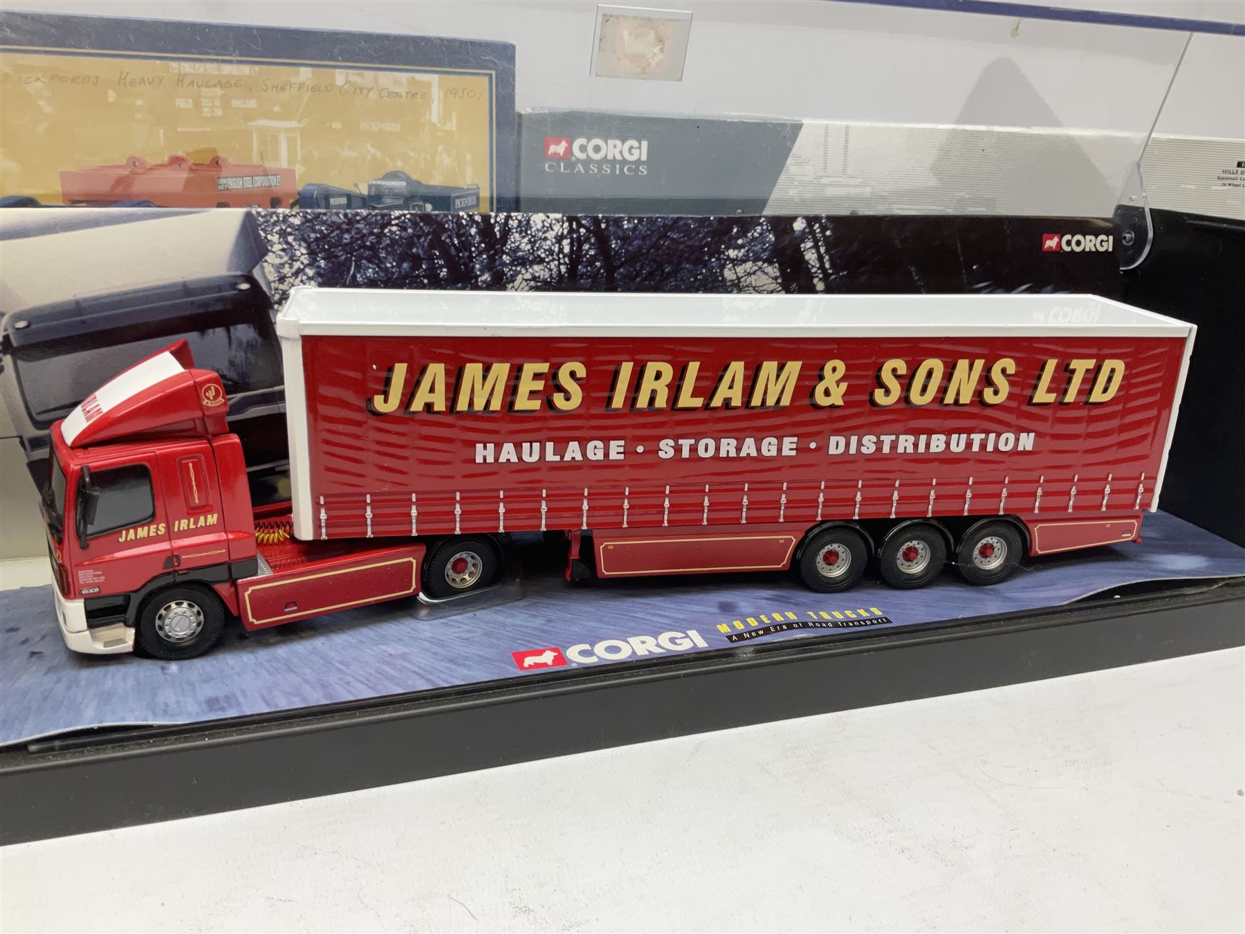 Corgi - Modern Trucks Series No.75401 Leyland Daf Curtainside James Irlam & Sons Ltd in perspex case; Classics Heavy Haulage No.17601 Scammell Constructor and 24 wheel low loader, boxed with certificate 01254/6800; and limited edition Classics No.55201 Pickfords Diamond T Ballast (x2) with 24 wheel Girder Trailer and Steel Casting Load, boxed with certificate 05318/8200. (3)