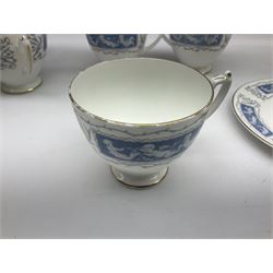 Coalport Revelry pattern tea and dinner wares, comprising nine dinner plates, four salad plates, eleven side plates, sauce boat and stand, ten teacups and ten saucers, and preserve pot and cover, together with a Coalport plate of shaped form decorated with pink roses, and a Royal Crown Derby Royal Antoinette pattern trio