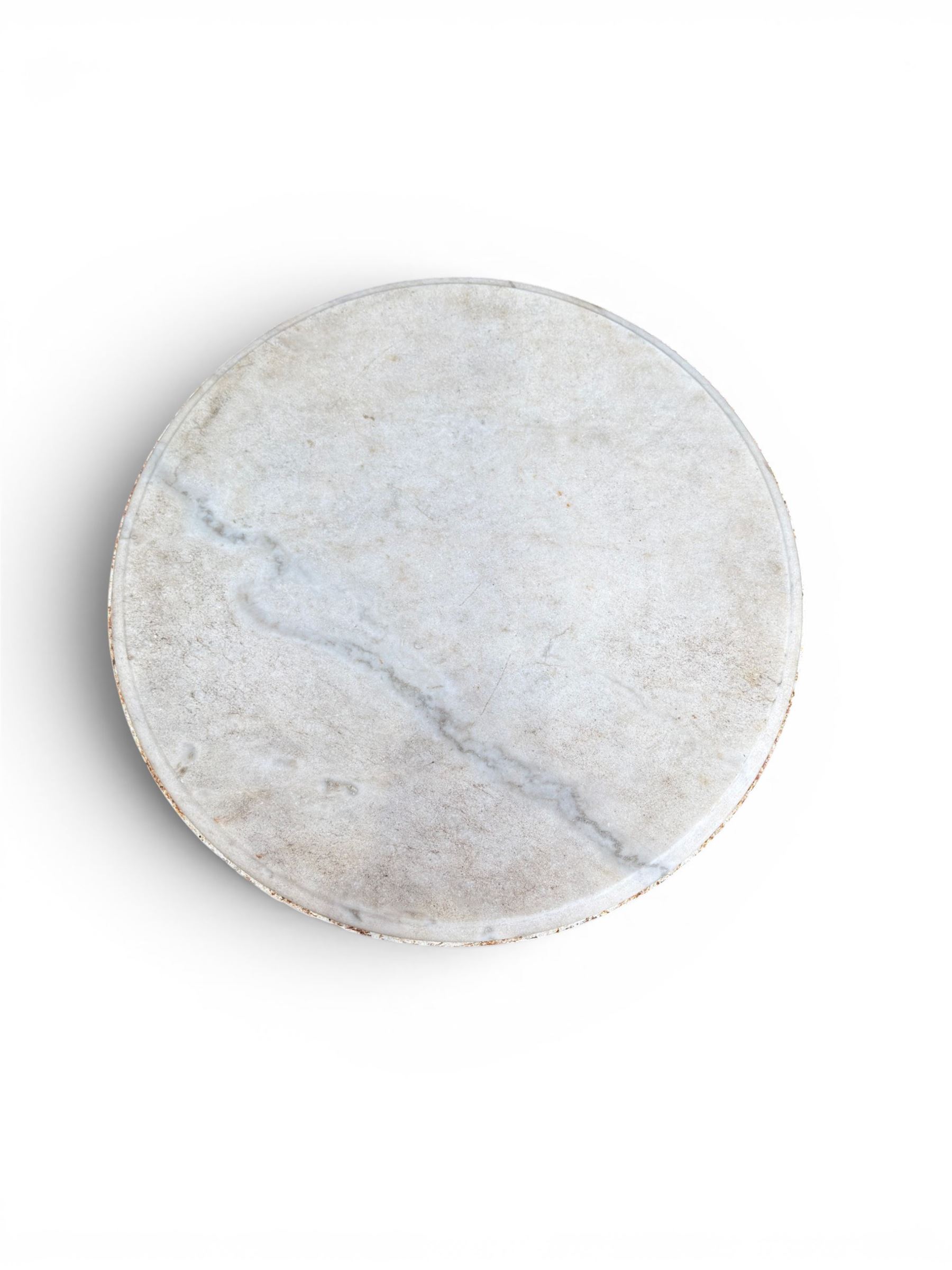 Victorian ornate cast iron garden table, trefoil base with central enclosed column, circular top with later marble, with registration mark