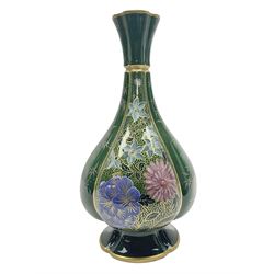 Royal Worcester vase of baluster form with floral decoration on a green ground H26cm