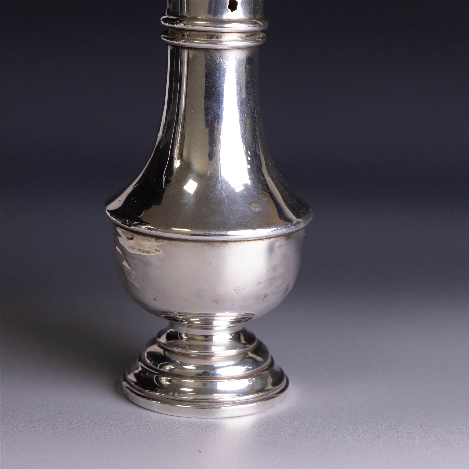 1920s silver sugar caster, of typical form with removable pierced cover and weighted base, hallmarked Marson & Jones, Birmingham 1923, H16cm