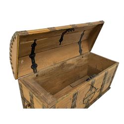 19th century painted oak sea chest, hinged dome top enclosing small compartment, bound by shaped and pressed metal strapwork, scumbled finish to resemble oak and painted with small vignettes depicting portraits and landscapes within panels, fitted with large wrought metal carrying handles, the front inscribed 'H.J.S. 1870' 