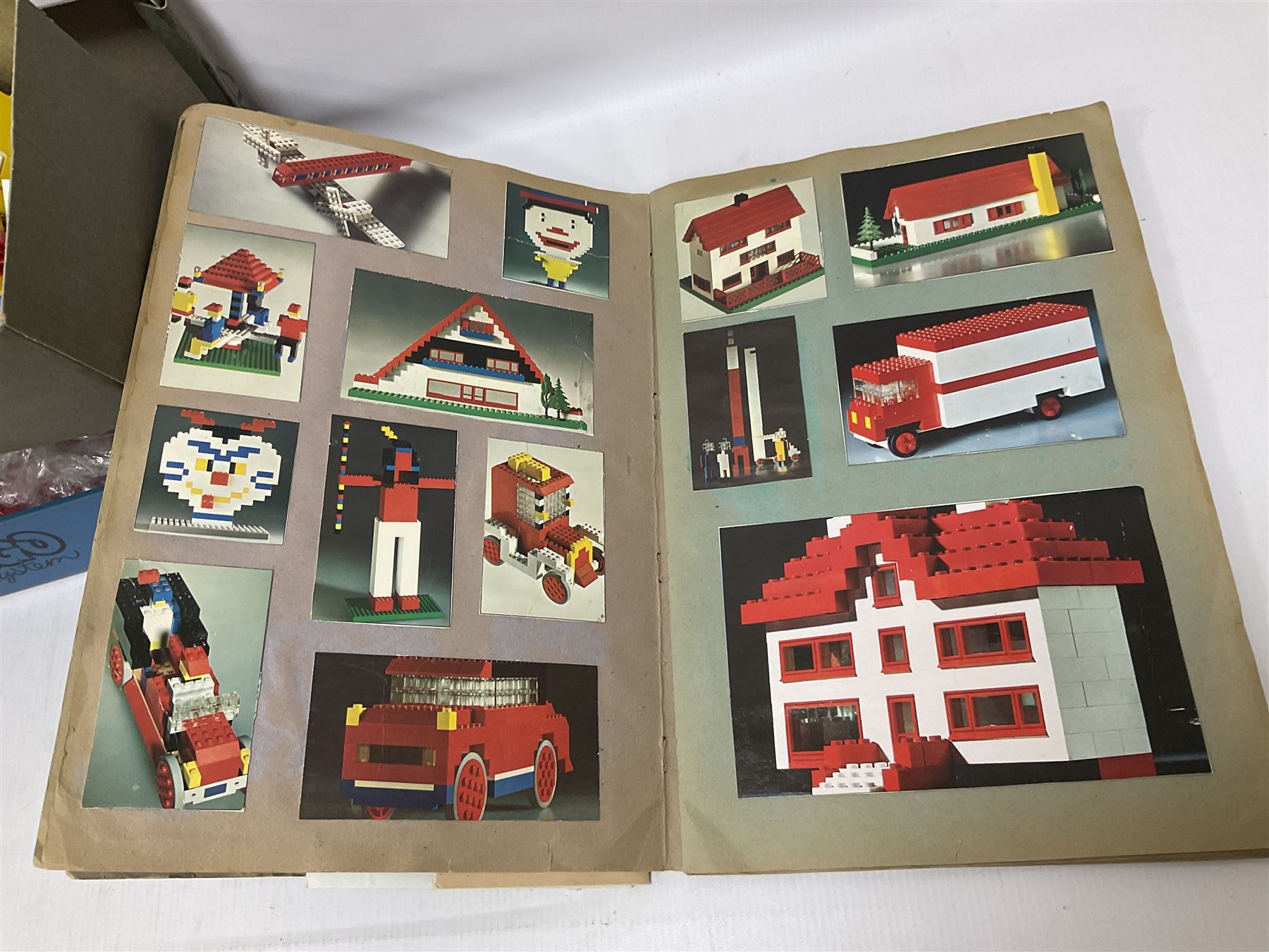 Fischer Technik/Lego/Playmobil - thirteen model building sets comprising eight Fischer Technik sets 50, 50/1, 50v, 50/2, 50+mot1 and two 50S, 50/1 add-on pack, with spare parts packs 01, 03, 05, two 22 and 30; two Lego sets comprising C107 and Lego Systems 103, part-set 870 and 970; Playmobil no.3520 set; four boxes of loose lego, various instruction manuals and a scrapbook 