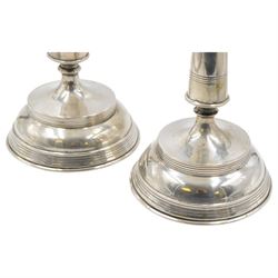 Pair of late 19th/early 20th century Austro-Hungarian 800 standard silver candlesticks, with tapering stems upon a domed base, stamped with Diana head with number 3 to the left, H33cm