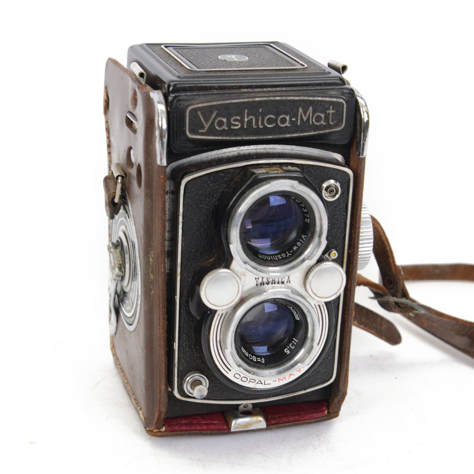 Yashica-Mat twin lens TLR camera body, serial no. 3040257, with twin Copal MXV Yashinon lenses 1:3.2 f=80mm and 1:3.5 f=80mm, with lens cap, in leather case, together with a Wray Supar f=4.5 lens