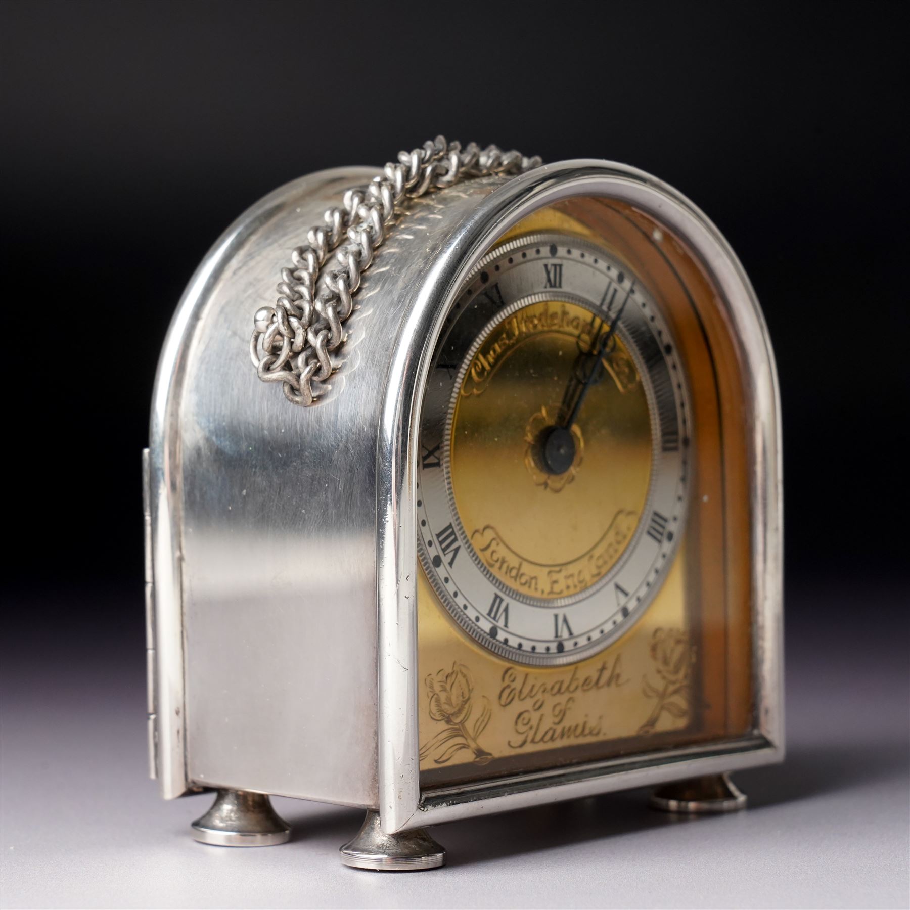 Chas Frodsham - Elizabeth II commemorative miniature carriage clock with platform lever escapement, gilt brass dial inscribed  'Elizabeth of Glamis' in domed silver case with chain handle H8cm London 1980 with key