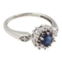 9ct white gold oval sapphire and round brilliant cut diamond cluster ring, with diamond set shoulders, hallmarked 