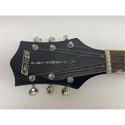 Gretsch Electromatic semi-acoustic guitar model G5129 in black and red with Bigsby tremolo, serial no.KS05063904; L105cm; in fitted hard carrying case