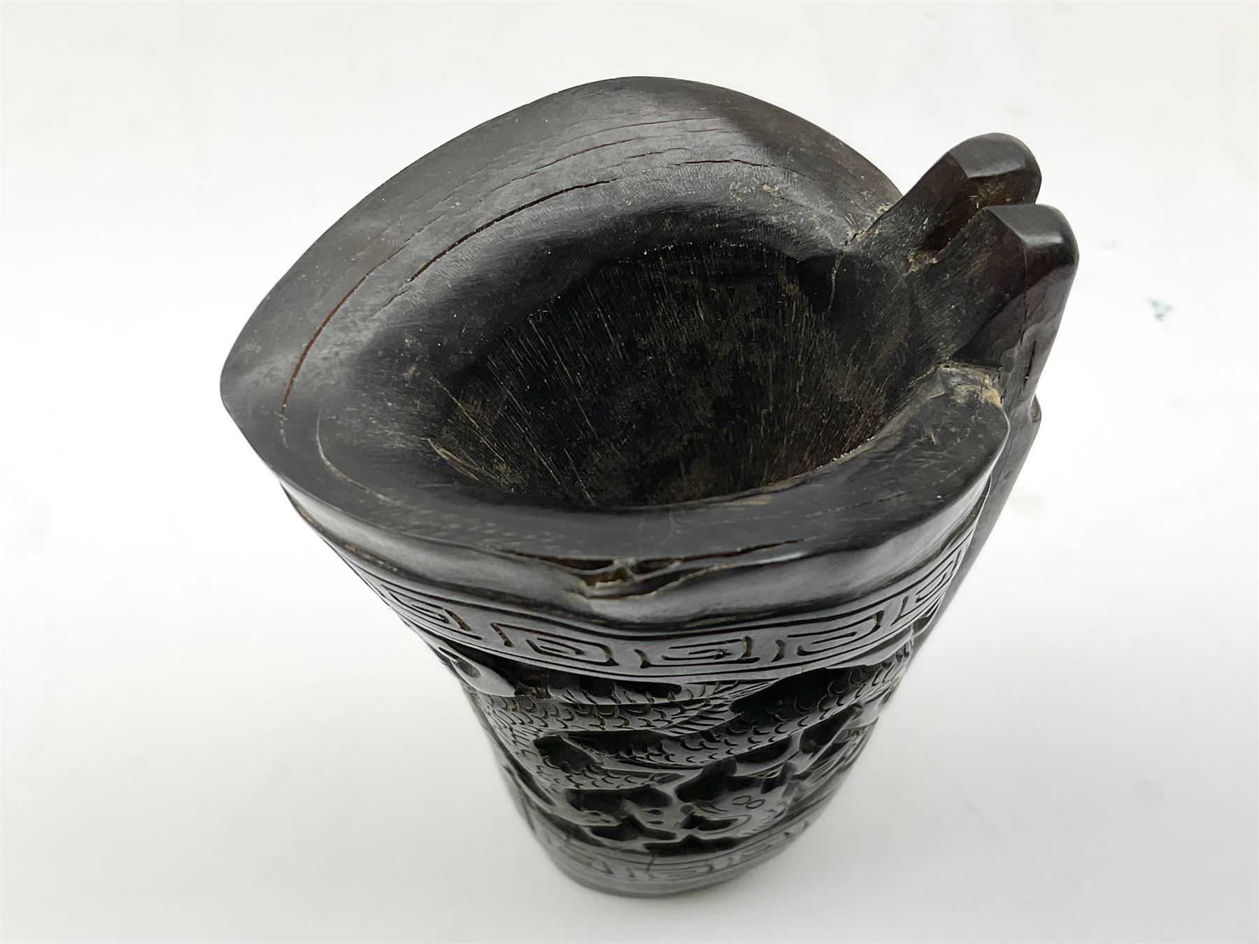 Chinese horn blood collection cup, carved with dragons and key fret border, H9.5cm
