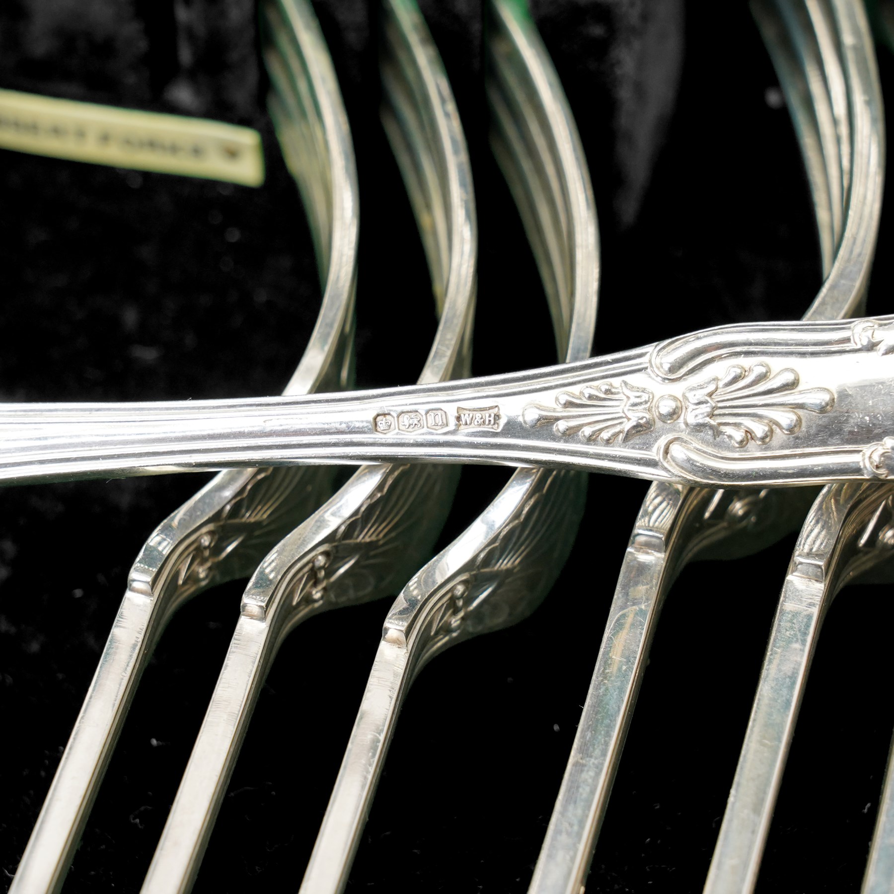 Extensive canteen of silver Kings Pattern cutlery for twelve covers comprising silver handled table and dessert knives, table and dessert forks, fish knives, forks and servers, dessert spoons, soup spoons and table spoons, sauce and soup ladles, salad servers, carving knives and forks etc 134 pieces in mahogany case with countersunk brass handles W49cm Sheffield 1928 Maker Walker & Hall 
