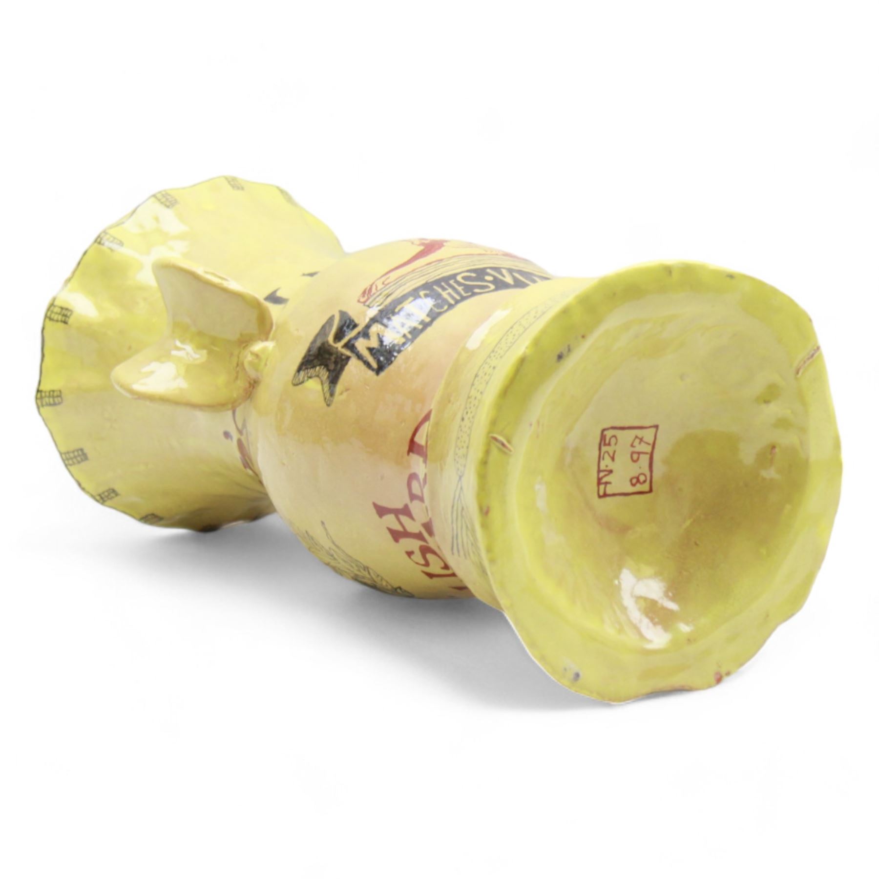 Hylton Nel (1941-) Studio pottery twin handled vase, 1997, the yellow ground decorated with Colman's English Mustard and Lions Matches, with stylised snake to the stepped base, with makers mark to the base HN.25 8.97, H36cm