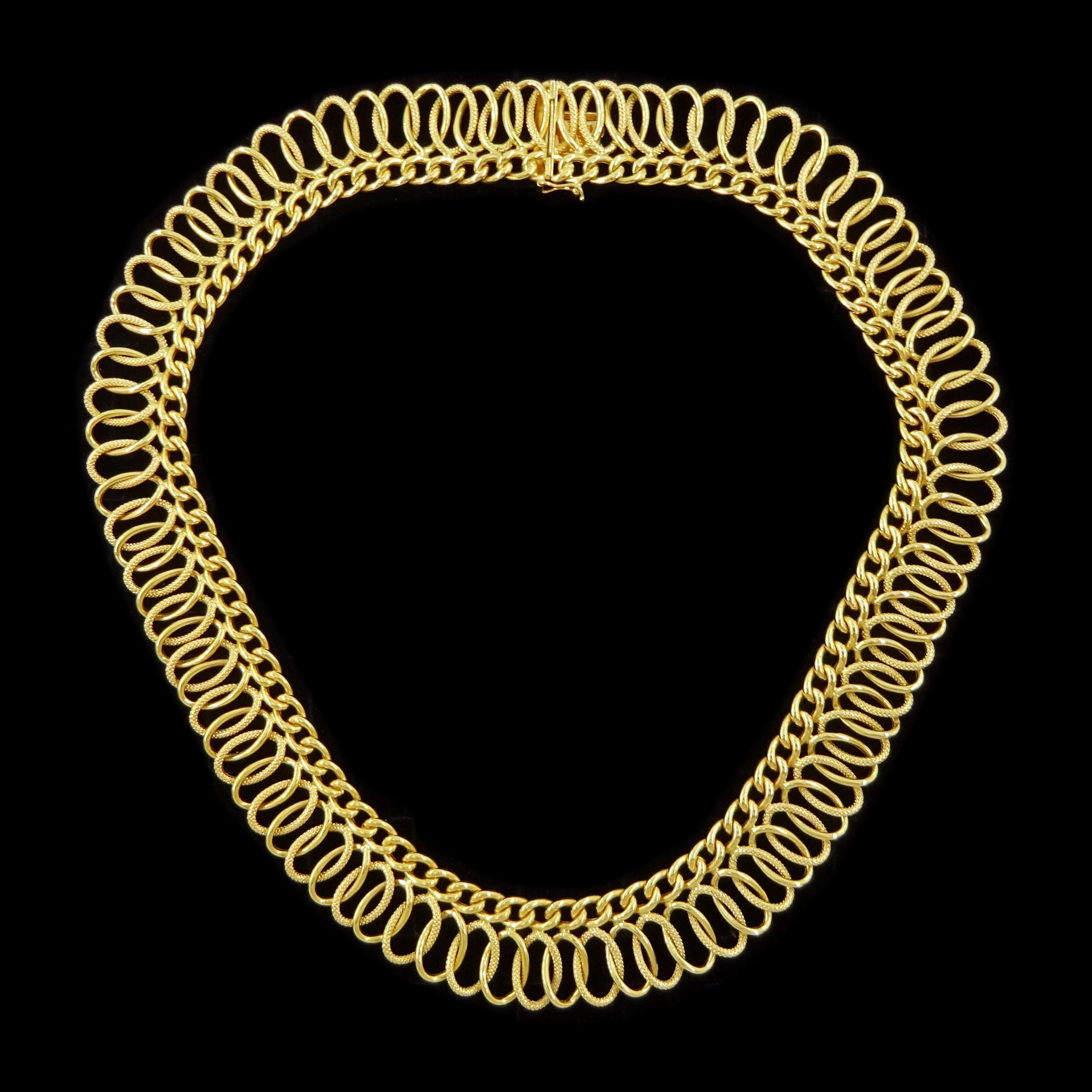 18ct gold fancy link necklace, polished and textured curb and woven openwork links, stamped 750