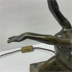 1930s Art Deco spelter table lamp, modelled as a nude woman holding aloft a spherical crizzled glass shade, upon a marble base, H48cm