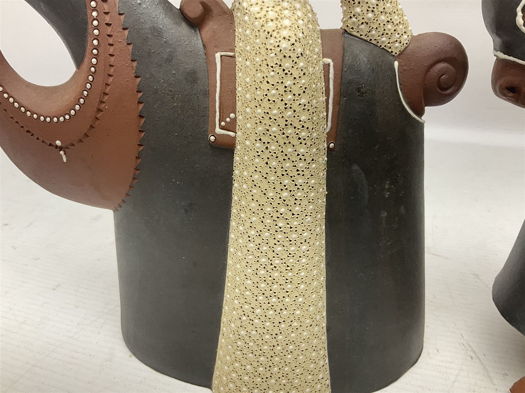 Leonard Stockley; two studio pottery figures modelled as a king and queen upon horses, both signed beneath,  H25cm