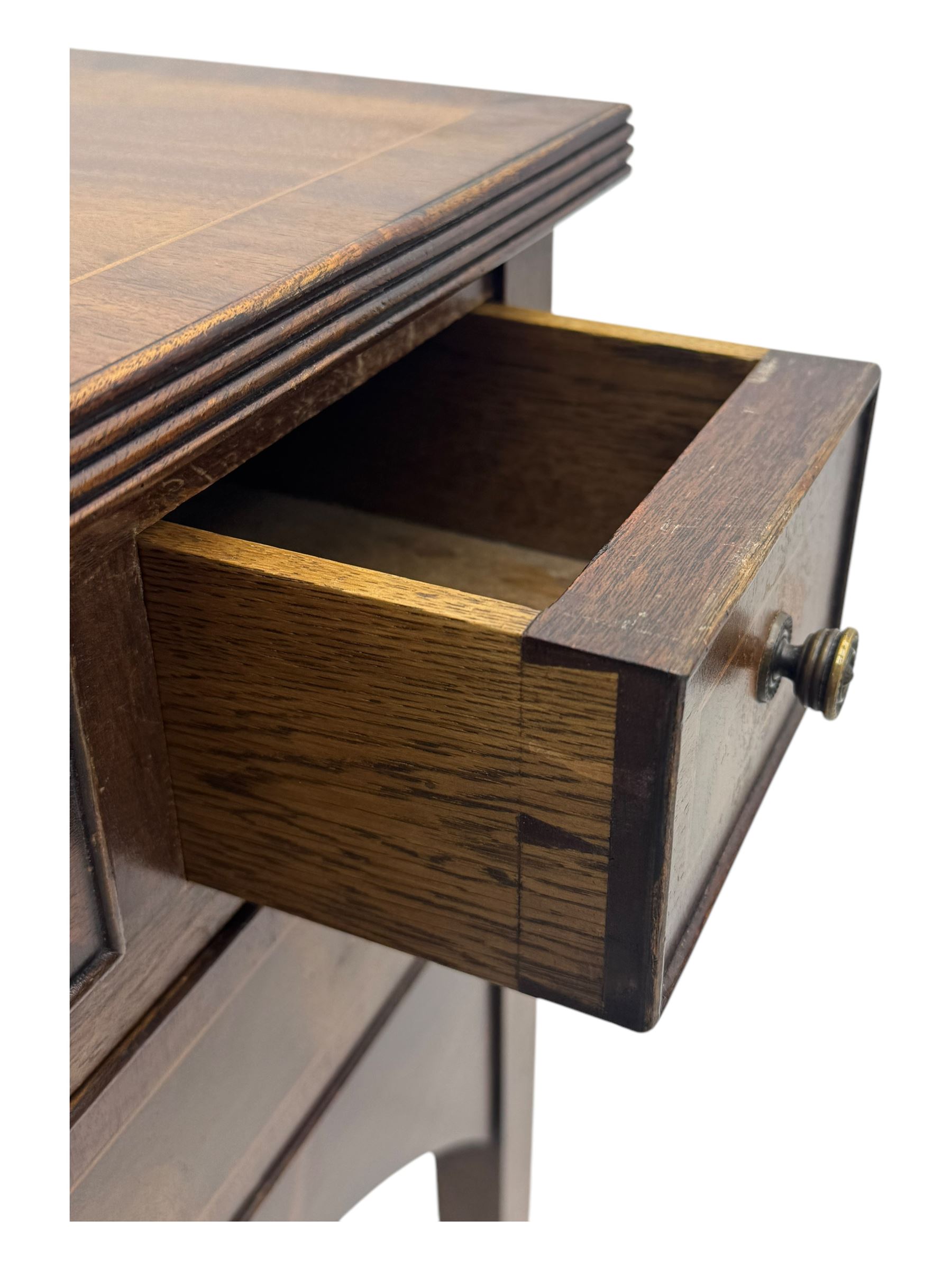 Georgian design inlaid mahogany side table, rectangular top with fluted edge over three short and one long drawer, arched apron, raised on slender supports 