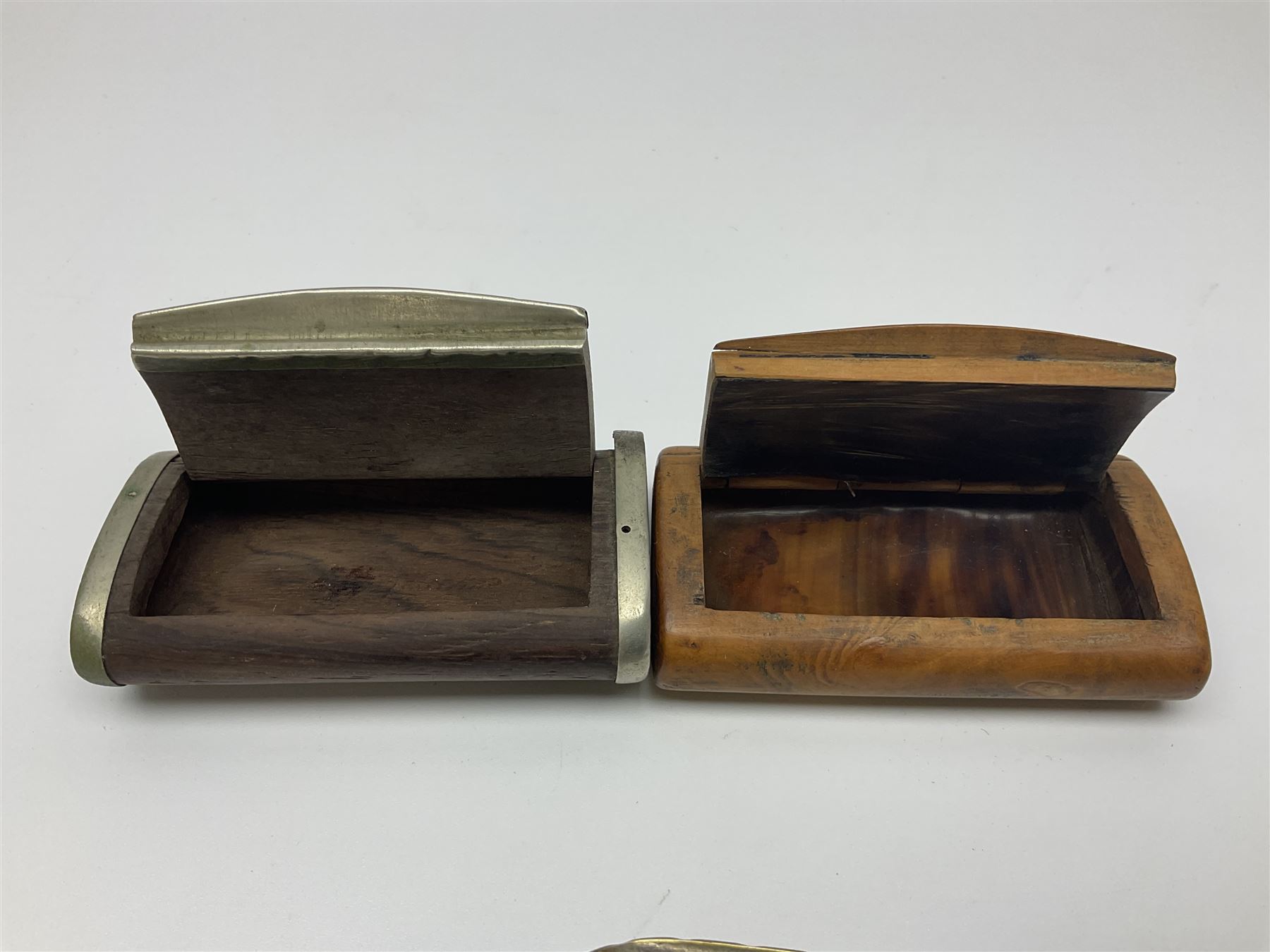 Five snuff boxes, including novelty snuff box in the form of a shoe, pierced example, rectangular hinged lid with white metal decoration and two others  