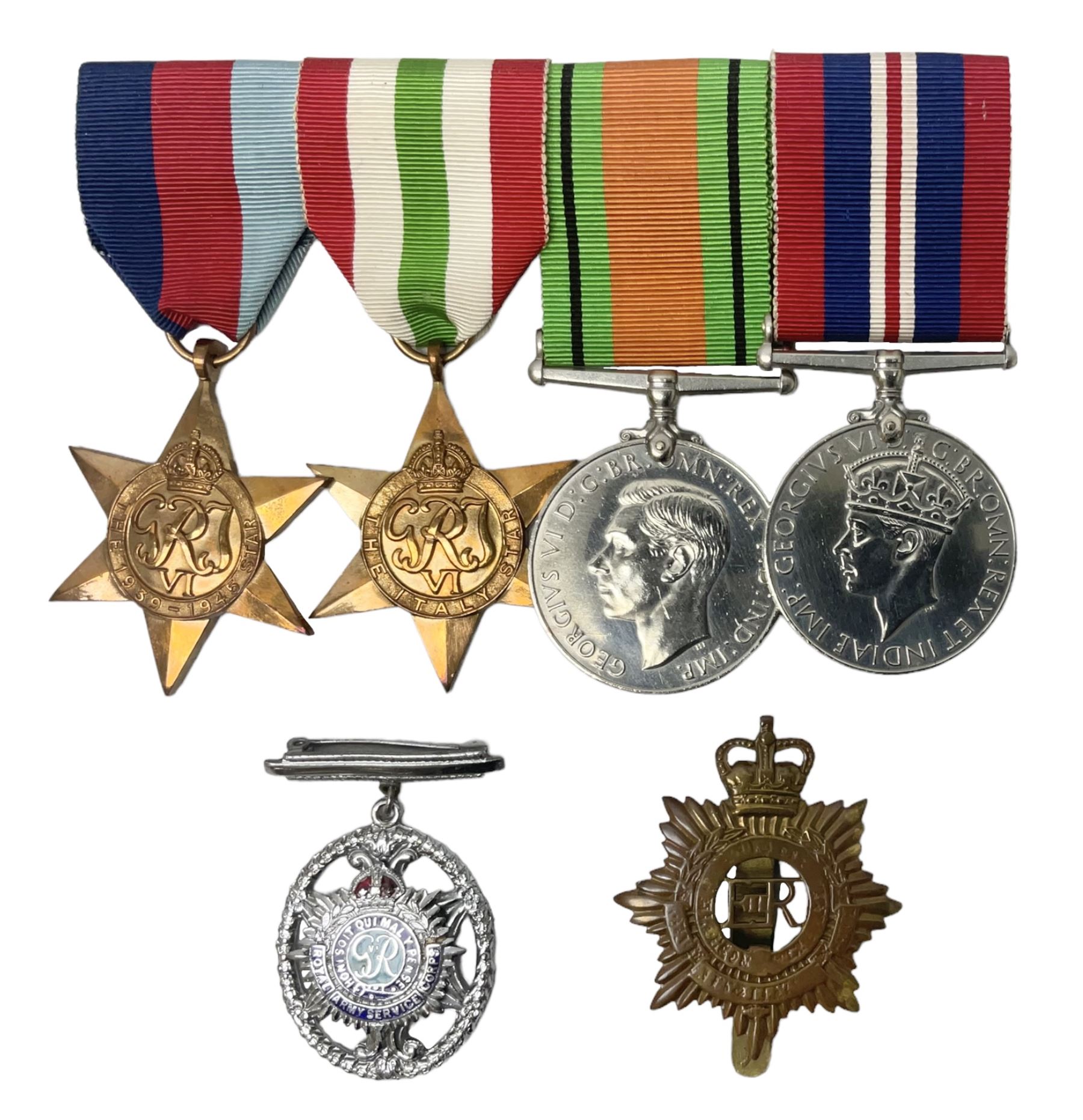 WW2 group of four medals comprising 1939-1945 War Medal, Defence Medal, Italy Star and 1939-1945 Star; with Royal Army Service Corps cap badge and RASC chrome and enamel sweetheart brooch