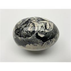Victorian pottery egg transfer, printed with scenes 'Androcles and the lion' and a courting couple, L7cm 
