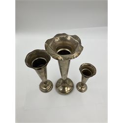 Three hallmarked silver trumpet vases with frilled rims and weighted bases, tallest H24cm