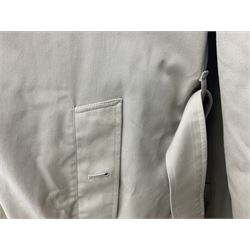 Ladies Burberry double breasted trench coat, with belt and detachable woollen gilet, in traditional cream colour with Burberry check lining, together with a gentlemans Burberry single breasted trench coat, both L112cm