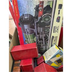 Collection of model railway buildings and other accessories, together with a box empty Hornby boxes, including three trainset boxes with pieces of track inside only