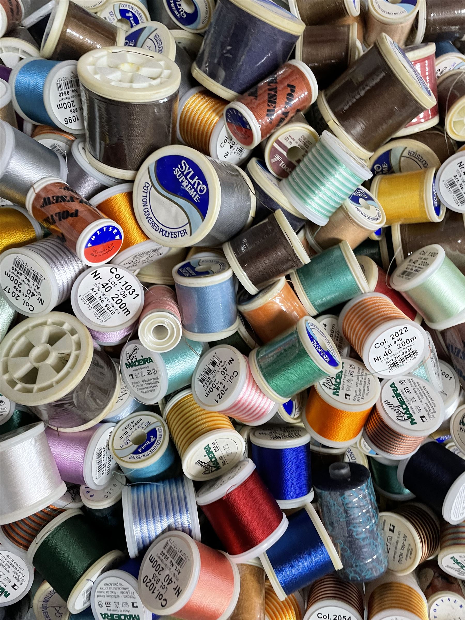 Haberdashery Shop Stock: Reels of Slyko Supreme & Raylon Madeira thread, Creative Craft pompoms and other craft-making supplies, boxes of Anchor Pearl Cotton, perforated plastic canvases etc in three boxes