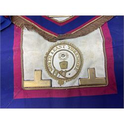 Two Masonic kid leather aprons, one with sash and cuffs, the other with sash, each marked 'Yorkshire North and East Ridings'; and three other unmarked Masonic aprons with sashes
