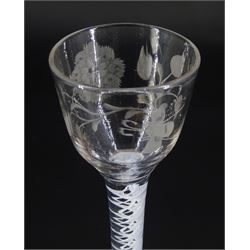 18th century drinking glass of possible Jacobite interest, the ogee bowl engraved with carnation and bee, upon a double series opaque twist stem and conical foot, H16cm