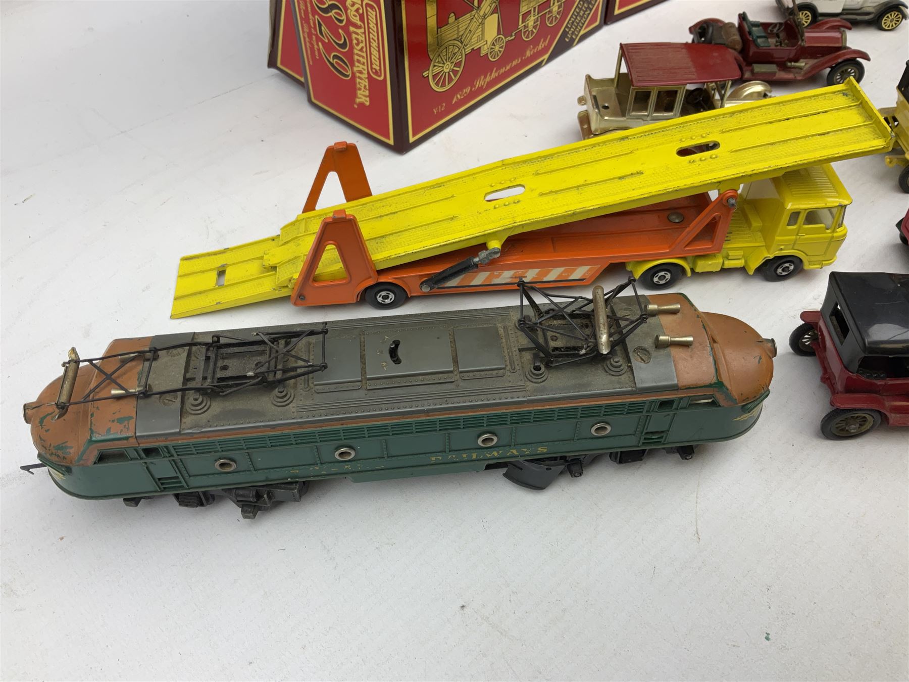 Three boxed Matchbox Models of Yesteryear models, boxed Corgi Silver Jubilee Bus, Matchbox Superkings Daf car transporter, other loose die-cast models to include Lledo, Corgi Classics etc