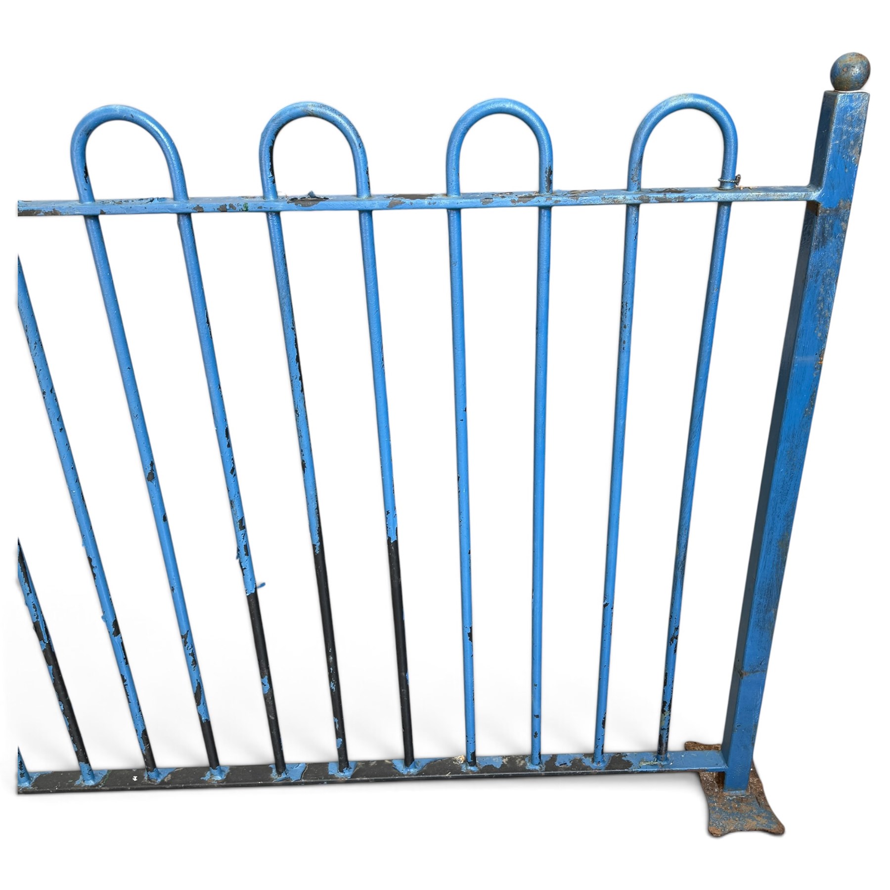 Two sections of painted iron garden or estate boundary railing, comprising a 19th century wrought iron section with graduated spearhead uprights, together with a later hoop-top section with ball-finial end posts, both in blue painted finish