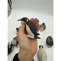 Group of eleven Scottish 'Isle of Arran' bisque porcelain birds, to include Great Northern Diver, Eider, great Crested Greebe, Artic Tern, King Penguin, etc.
