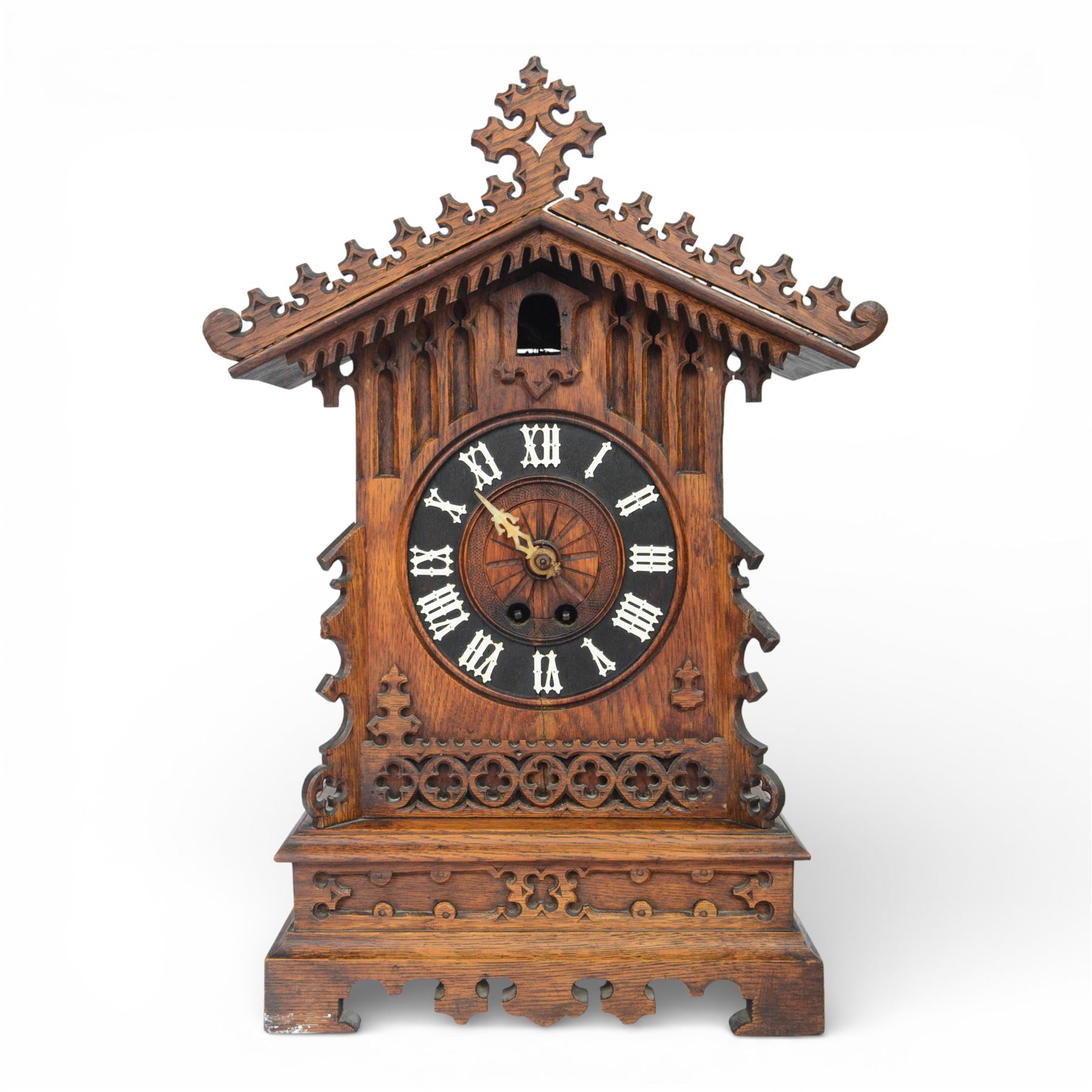 19th century Black Forest cuckoo mantel clock with carved architectural case, with eight day gong striking movement