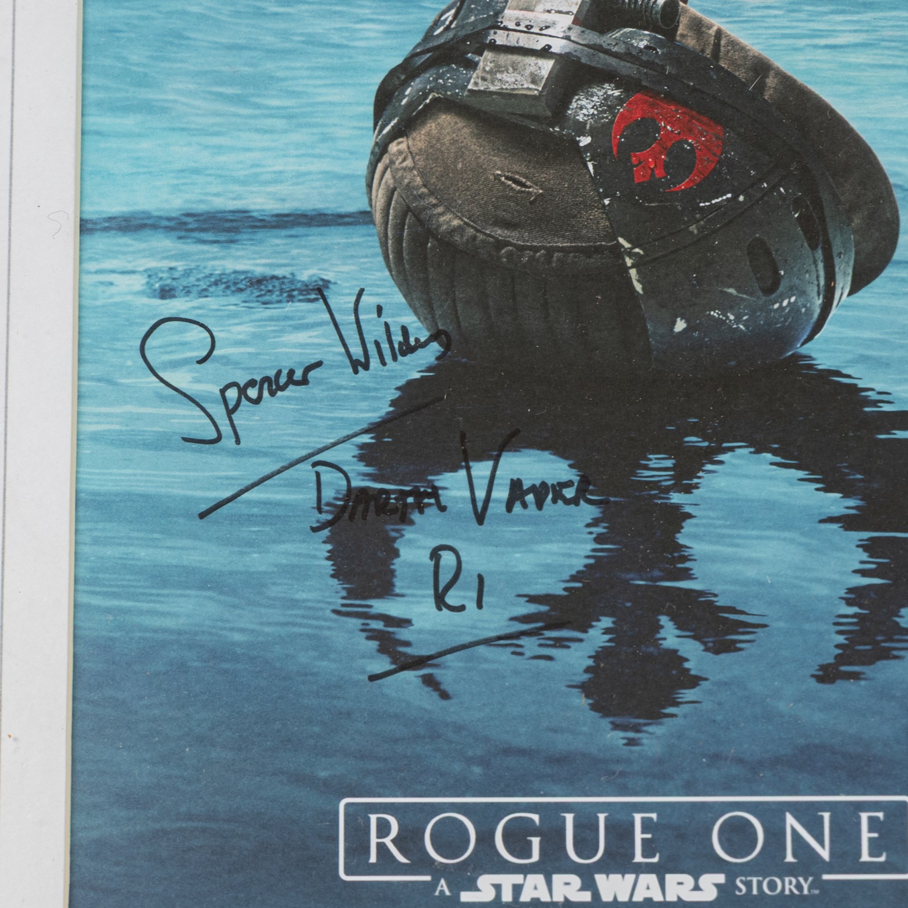 Signed Star Wars prints, comprising Rogue One Cineworld poster signed by Spencer Wilding (Darth Vader), portrait of Lando Calrissian signed by Billy Dee Williams, still of Boba Fett and Jango Fett signed by Daniel Logan and Temuera Morrison and a still of Darth Maul signed by Ray Park, R2-D2 signed by Kenny Baker and a C-3PO montage signed by Anthony Daniels, all framed 