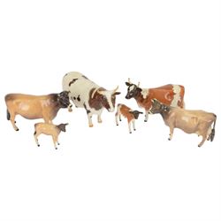 Six Beswick cattle figures, comprising Jersey family group; Bull Ch. Dunsley Coy Boy, model 1422, Cow Ch. Newton Tinkle, model 1345 and Calf, model 1249, Ayrshire family group; Bull Ch. Whitehill Mandate, model 1454, Cow Ch. Ickham Bessie, model 1350, and Calf, model 1249