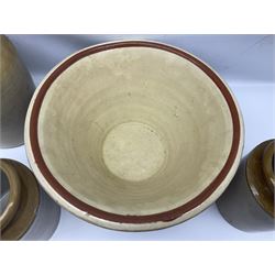 Terracotta bread proving bowl, together with three stoneware jars, tallest H26.5cm