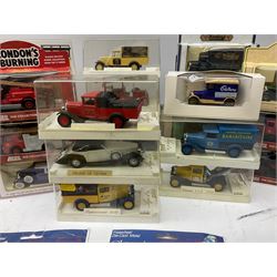 Various makers - twenty-six modern die-cast models including seven Lledo London's Burning; eight Solido Age D'Or in hard plastic display cases; Corgi; Atlas etc; all boxed/blister packed (26)