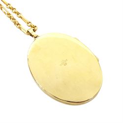 Gold oval locket with engraved decoration, on a gold fancy link chain, both 9ct, hallmarked 