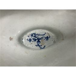 Large 18th century Lowestoft sauce boat, circa 1770, the body decorated with Hughes type floral moulding, and painted in underglaze blue with an Oriental landscape, and foliate sprigs, L23cm