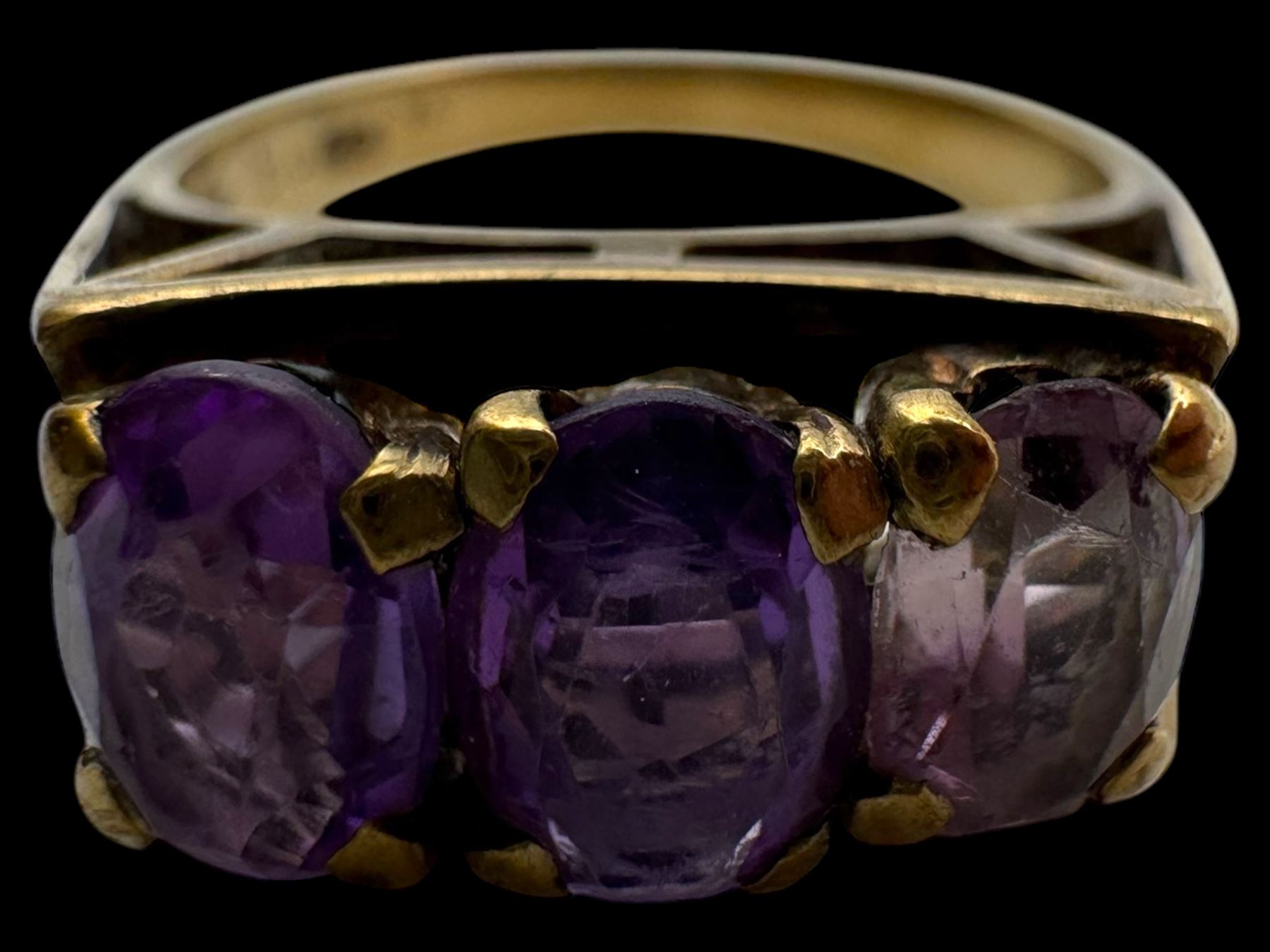 Two pairs of 9ct gold hoop earrings, three 9ct gold earring backs and an 8ct gold three stone ring