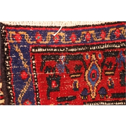  Kurdish red ground rug, repeating border, central lozenge medallion, 170cm x 126cm  