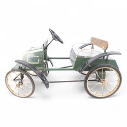 Triang child's pedal car in the style of a vintage automotive, likely a De Dion Bouton or an early Renault, painted in dark green with pale yellow details, H52cm