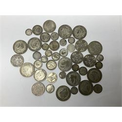 Approximately 280 grams of Great British pre 1947 silver coins, Barbados 1994 silver one dollar, Fiji 1994 silver proof five dollars, Western Samoa silver proof ten dollars, Guernsey 1995 silver proof one pound coin etc