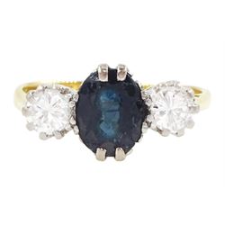 18ct gold sapphire and diamond three stone ring, single oval cut sapphire, with two round ...