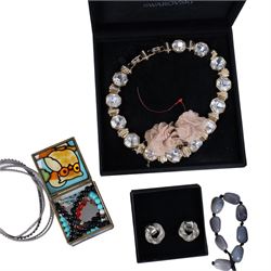 Collection of boxed Swarovski crystal jewellery, including statement necklaces, rings, bracelets and earrings, and a collection of costume jewellery including beaded necklaces