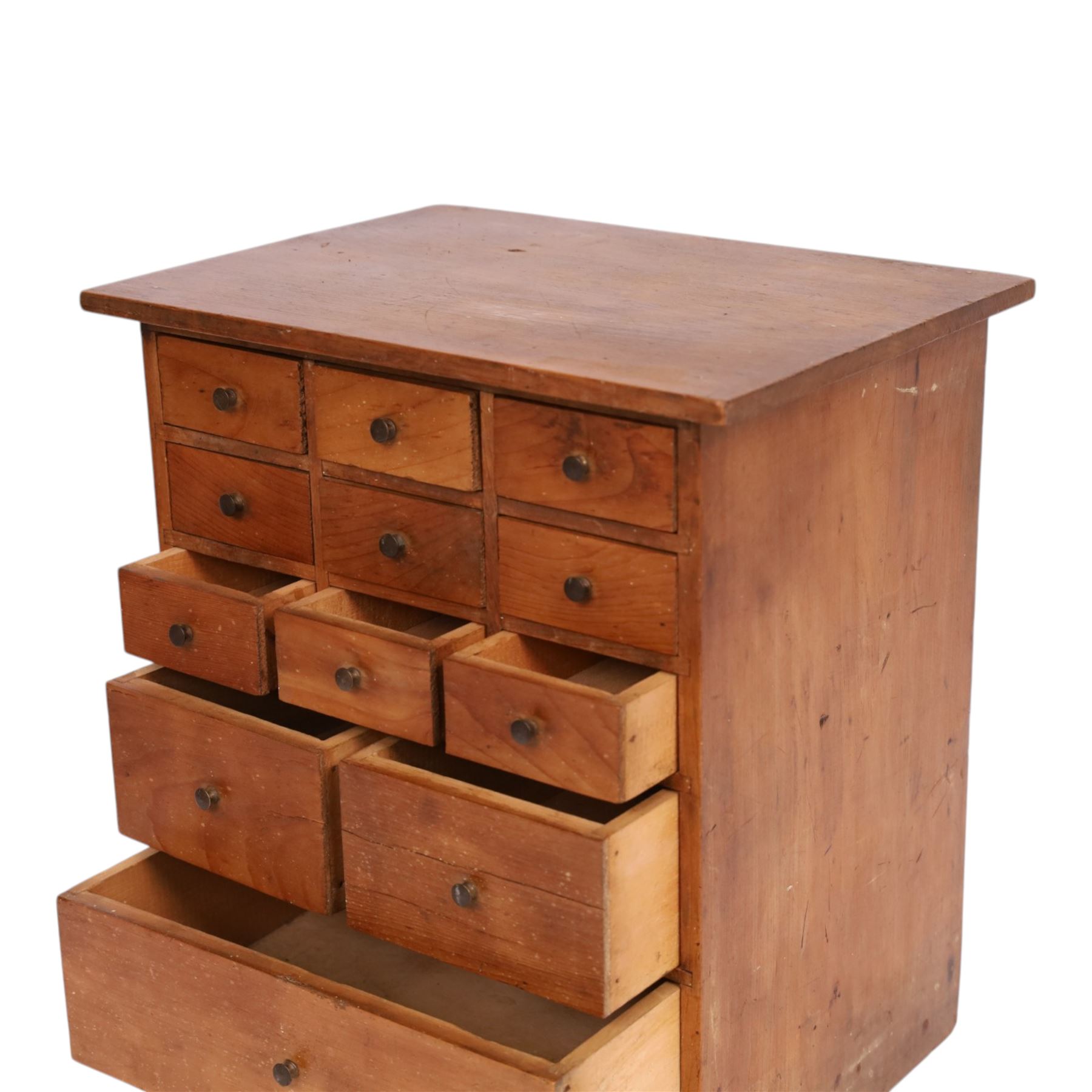 Miniature pine table top chest of twelve drawers, H35cm